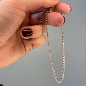 18 karat rhodium filled twist, anklet, length 8 inch with a 2 inch extender